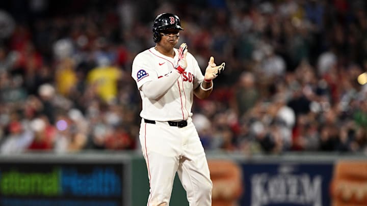 Rafael Devers reacts after driving in a run earlier this season.