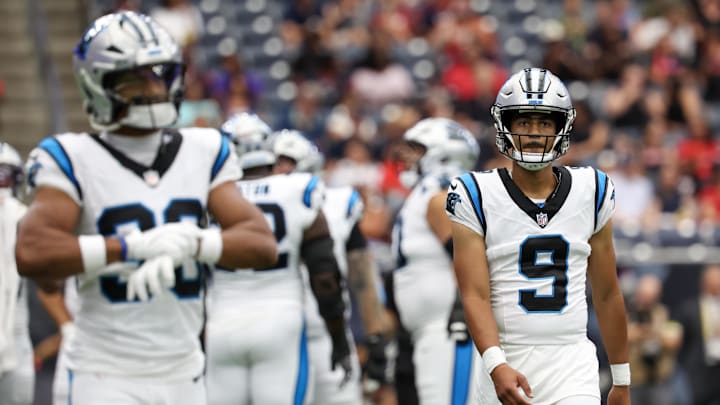 Aug 16, 2025; Houston, Texas, USA; Carolina Panthers quarterback Bryce Young (9) looks to the sidelines for a play against the Houston Texans in the first quarter at NRG Stadium. Mandatory Credit: Thomas Shea-Imagn Images