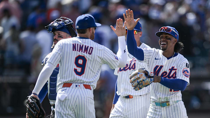 Jul 23, 2025; New York City, New York, USA; New York Mets shortstop Francisco Lindor (12) high fives outfielder Brandon Nimmo (9) after winning against the Los Angeles Angels at Citi Field. Mandatory Credit: John Jones-Imagn Images