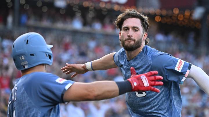 Jun 13, 2026; Washington, District of Columbia, USA; Washington Nationals center fielder Dylan Crews (3) celebrates scoring a run with catcher Drew Millas (14) against the Seattle Mariners during the seventh inning at Nationals Park. Mandatory Credit: Rafael Suanes-Imagn Images