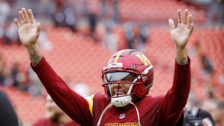 Washington Commanders wide receiver Chris Moore reacts after a touchdown by wide receiver Luke McCaffrey.