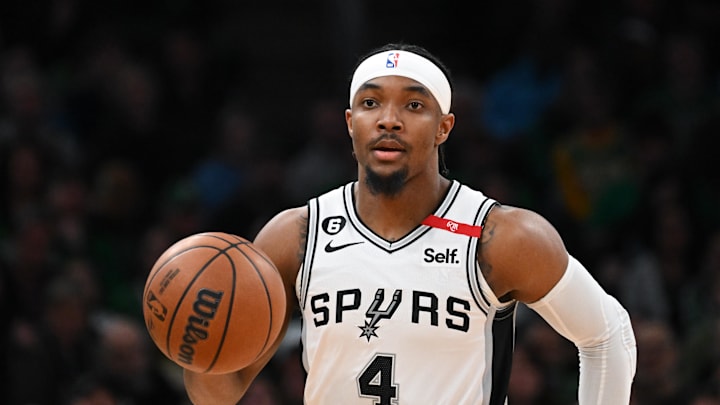 Mar 26, 2023; Boston, Massachusetts, USA; San Antonio Spurs guard Devonte' Graham (4) dribbles the