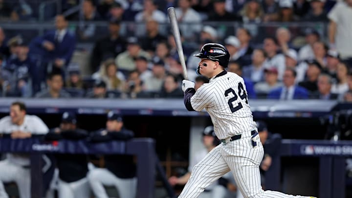 New York Yankees outfielder Alex Verdugo (24) hits an RBI single during the second inning against the Los Angeles Dodgers in game four of the 2024 MLB World Series at Yankee Stadium. New York Yankees outfielder Alex Verdugo (24) hits an RBI single during the second inning against the Los Angeles Dodgers in game four of the 2024 MLB World Series at Yankee Stadium.