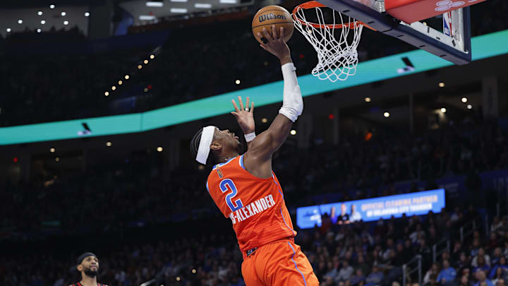 Dec 29, 2025; Oklahoma City, Oklahoma, USA; Oklahoma City Thunder guard Shai Gilgeous-Alexander (2) goes up for a basket against the Atlanta Hawks during the second half at Paycom Center. Mandatory Credit: Alonzo Adams-Imagn Images