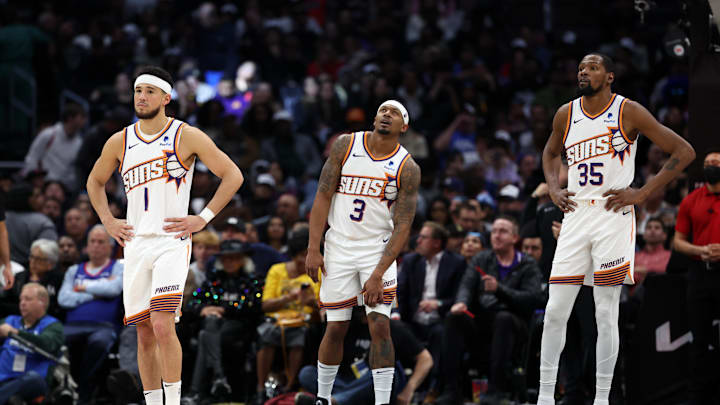 Jan 8, 2024; Los Angeles, California, USA;  Phoenix Suns guard Devin Booker (1) and guard Bradley Beal (3) and forward Kevin Durant (35) stands on the floor during the fourth quarter against the Los Angeles Clippers at Crypto.com Arena. Mandatory Credit: Kiyoshi Mio-Imagn Images