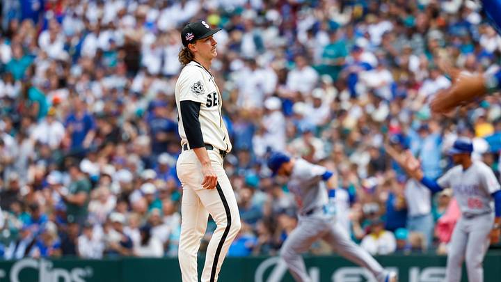 Aug 23, 2026; Seattle, Washington, USA; Seattle Mariners starting pitcher Bryce Miller (50) reacts after surrendering a grand-slam home run to Chicago Cubs left fielder Ian Happ (8, background) during the third inning at T-Mobile Park. Mandatory Credit: Joe Nicholson-Imagn Images Aug 23, 2026; Seattle, Washington, USA; Seattle Mariners starting pitcher Bryce Miller (50) reacts after surrendering a grand-slam home run to Chicago Cubs left fielder Ian Happ (8, background) during the third inning at T-Mobile Park. Mandatory Credit: Joe Nicholson-Imagn Images