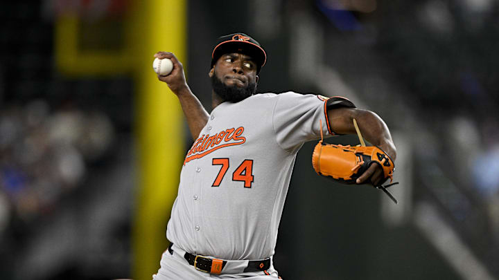 Jun 30, 2025; Arlington, Texas, USA; Baltimore Orioles relief pitcher Felix Bautista (74) pitches against the Texas Rangers during the ninth inning at Globe Life Field. Mandatory Credit: Jerome Miron-Imagn Images