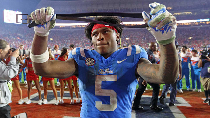 Mississippi Rebels running back Kewan Lacy (5) reacts with a belt after defeating the Florida Gators at Vaught-Hemingway Stadium. 