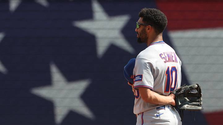 Aug 9, 2026; Pittsburgh, Pennsylvania, USA; New York Mets second baseman Marcus Semien (10) stands for the playing of God Bless America during the seventh inning stretch against the Pittsburgh Pirates at PNC Park. Mandatory Credit: Charles LeClaire-Imagn Images Aug 9, 2026; Pittsburgh, Pennsylvania, USA; New York Mets second baseman Marcus Semien (10) stands for the playing of God Bless America during the seventh inning stretch against the Pittsburgh Pirates at PNC Park. Mandatory Credit: Charles LeClaire-Imagn Images