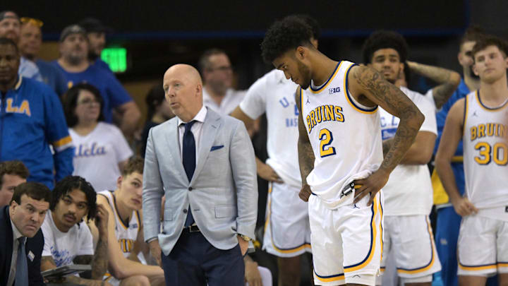 Jan 31, 2026; Los Angeles, California, USA; UCLA Bruins head coach Mick Cronin and guard Donovan Dent (2) react on the bench as the lost to the Indiana Hoosiers in double overtime at Pauley Pavilion presented by Wescom Financial. Mandatory Credit: Jayne Kamin-Oncea-Imagn Images