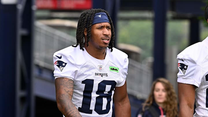New England Patriots wide receiver Kyle Williams (18) walks to the practice fields at Gillette Stadium. New England Patriots wide receiver Kyle Williams (18) walks to the practice fields at Gillette Stadium.
