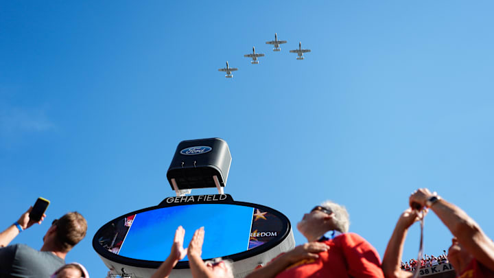Sep 28, 2025; Kansas City, Missouri, USA; Fans watch the flyover before the game between the Kansas City Chiefs and Baltimore Ravens at GEHA Field at Arrowhead Stadium. Mandatory Credit: Jay Biggerstaff-Imagn Images