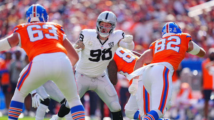 Oct 6, 2024; Denver, Colorado, USA; Las Vegas Raiders defensive end Maxx Crosby (98) during the second quarter against the Denver Broncos at Empower Field at Mile High. Mandatory Credit: Ron Chenoy-Imagn Images Oct 6, 2024; Denver, Colorado, USA; Las Vegas Raiders defensive end Maxx Crosby (98) during the second quarter against the Denver Broncos at Empower Field at Mile High. Mandatory Credit: Ron Chenoy-Imagn Images