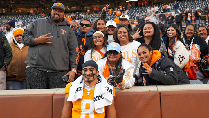 Tennessee quarterback Nico Iamaleava (8) poses for a picture with his family after winning a NCAA football game between Tennessee and UTEP in Neyland Stadium on Saturday, November 23, 2024.