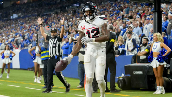 Houston Texans wide receiver Nico Collins (12) scores a touchdown Sunday, Nov. 30, 2025, during a game against the Indianapolis Colts at Lucas Oil Stadium in Indianapolis. Houston Texans wide receiver Nico Collins (12) scores a touchdown Sunday, Nov. 30, 2025, during a game against the Indianapolis Colts at Lucas Oil Stadium in Indianapolis.