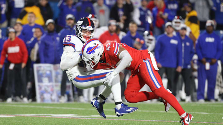 Buffalo Bills linebacker Terrel Bernard (43) hits New York Giants wide receiver Jalin Hyatt (13) just as he catches the ball during a 2023 meeting.