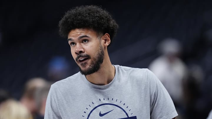 Mar 6, 2026; Denver, Colorado, USA; Denver Nuggets forward Cameron Johnson (23) warms up before the game against the New York Knicks at Ball Arena. Mandatory Credit: Ron Chenoy-Imagn Images