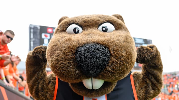 Sep 14, 2024; Corvallis, Oregon, USA; Oregon State Beavers mascot Benny flexes during the second half against the Oregon Ducks at Reser Stadium. Mandatory Credit: Craig Strobeck-Imagn Images