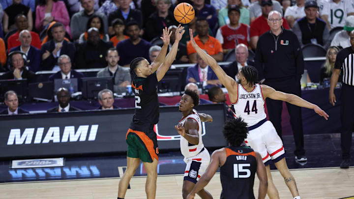 Apr 1, 2023; Houston, TX, USA; Miami (Fl) Hurricanes guard Isaiah Wong (2) shoots the ball over Connecticut Huskies guard Andre Jackson Jr. (44) during the second half in the semifinals of the Final Four of the 2023 NCAA at NRG Stadium. Mandatory Credit: Troy Taormina-USA TODAY Sports