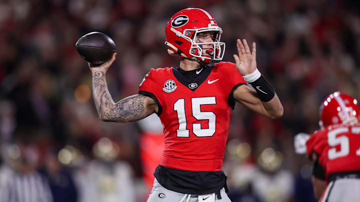 Nov 29, 2024; Athens, Georgia, USA; Georgia Bulldogs quarterback Carson Beck (15) throws a pass against the Georgia Tech Yellow Jackets in the first quarter at Sanford Stadium. Mandatory Credit: Brett Davis-Imagn Images
