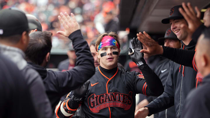 Apr 25, 2026; San Francisco, California, USA; San Francisco Giants center fielder Drew Gilbert (center) is congratulated by teammates after hitting a home run against the Miami Marlins during the fifth inning at Oracle Park. Mandatory Credit: Darren Yamashita-Imagn Images