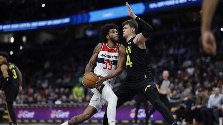 Jan 25, 2024; Washington, District of Columbia, USA; Washington Wizards forward Marvin Bagley III (35) drives to the basket as Utah Jazz center Walker Kessler (24) defends in the first half at Capital One Arena. Mandatory Credit: Geoff Burke-Imagn Images Jan 25, 2024; Washington, District of Columbia, USA; Washington Wizards forward Marvin Bagley III (35) drives to the basket as Utah Jazz center Walker Kessler (24) defends in the first half at Capital One Arena. Mandatory Credit: Geoff Burke-Imagn Images