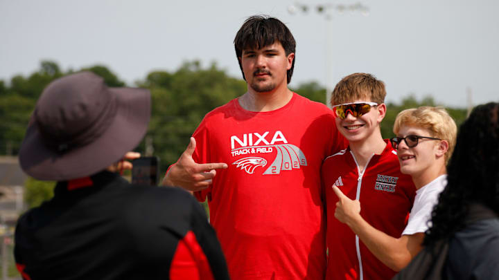 Fans lines up to have their photo taken with Nixa junior Jackson Cantwell after he competed in the shot put championship on May 31, 2025, in Jefferson City. Cantwell, the No. 1 football recruit in the 2026 class, committed to Miami (Florida) earlier in the month.