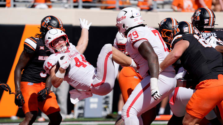 Houston Cougars running back Dean Connors (44) scores a touchdown during a college football game between the Oklahoma State Cowboys (OSU) and the Houston Cougars at Boone Pickens Stadium in Stillwater, Okla., Saturday, Oct. 11, 2025. Houston won 39-17.