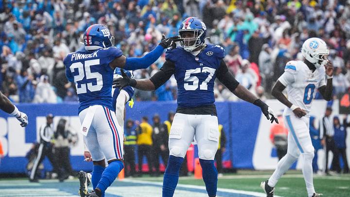 New York Giants defensive lineman Chauncey Golston (57) and New York Giants safety Jason Pinnock (25) celebrate during a game against the Tennessee Titans at MetLife Stadium, Sep 27, 2026, East Rutherford, NJ, USA. New York Giants defensive lineman Chauncey Golston (57) and New York Giants safety Jason Pinnock (25) celebrate during a game against the Tennessee Titans at MetLife Stadium, Sep 27, 2026, East Rutherford, NJ, USA.