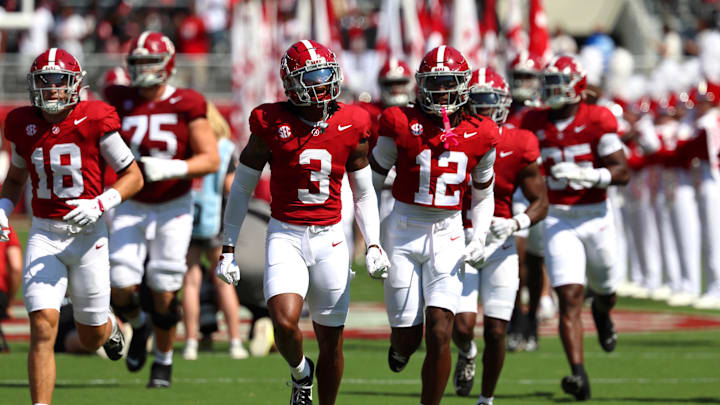 Sep 13, 2025; Tuscaloosa, Alabama, USA; Alabama Crimson Tide players take the field before the game against the Wisconsin Badgers at Saban Field at Bryant-Denny Stadium. Mandatory Credit: David Leong-Imagn Images Sep 13, 2025; Tuscaloosa, Alabama, USA; Alabama Crimson Tide players take the field before the game against the Wisconsin Badgers at Saban Field at Bryant-Denny Stadium. Mandatory Credit: David Leong-Imagn Images