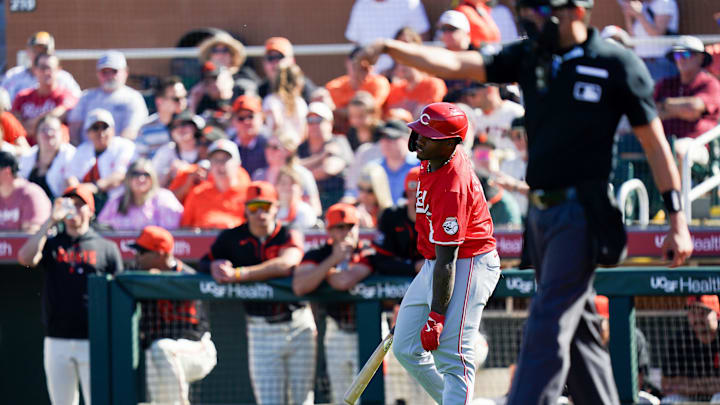 Cincinnati Reds first baseman Cam Collier reacts after getting hit with the ball in the sixth inning of a Cactus League game between the Cincinnati Reds and San Francisco Giants, Sunday, Feb. 23, 2025, at Scottsdale Stadium in Scottsdale, Ariz. Giants won 5-2.