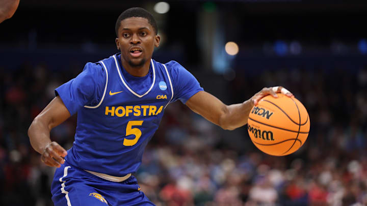 Mar 20, 2026; Tampa, FL, USA; Hofstra Pride guard Cruz Davis (5) dribbles in the second half against the Alabama Crimson Tide during a first round game of the men's 2026 NCAA Tournament at Benchmark International Arena. Mandatory Credit: Nathan Ray Seebeck-Imagn Images Mar 20, 2026; Tampa, FL, USA; Hofstra Pride guard Cruz Davis (5) dribbles in the second half against the Alabama Crimson Tide during a first round game of the men's 2026 NCAA Tournament at Benchmark International Arena. Mandatory Credit: Nathan Ray Seebeck-Imagn Images