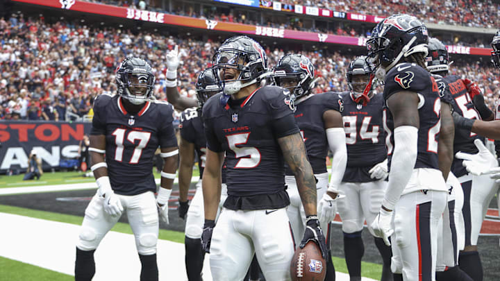 Oct 27, 2024; Houston, Texas, USA; Houston Texans safety Jalen Pitre (5) celebrates after making an interception during the second quarter against the Indianapolis Colts at NRG Stadium. Mandatory Credit: Troy Taormina-Imagn Images Oct 27, 2024; Houston, Texas, USA; Houston Texans safety Jalen Pitre (5) celebrates after making an interception during the second quarter against the Indianapolis Colts at NRG Stadium. Mandatory Credit: Troy Taormina-Imagn Images