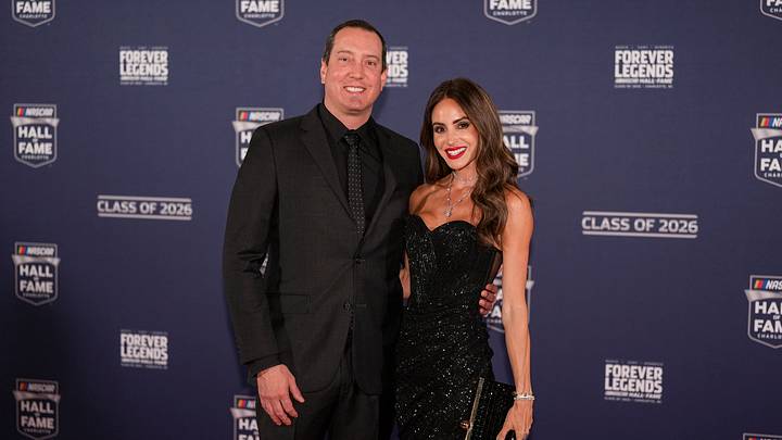 Kyle Busch and his wife Samantha pose on the red carpet during the NASCAR Hall of Fame Induction at Charlotte Convention Center Kyle Busch and his wife Samantha pose on the red carpet during the NASCAR Hall of Fame Induction at Charlotte Convention Center