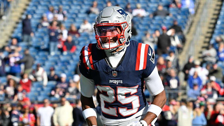 Nov 17, 2024; Foxborough, Massachusetts, USA; New England Patriots cornerback Marcus Jones (25) warms up before a game against the Los Angeles Rams at Gillette Stadium. Mandatory Credit: Eric Canha-Imagn Images