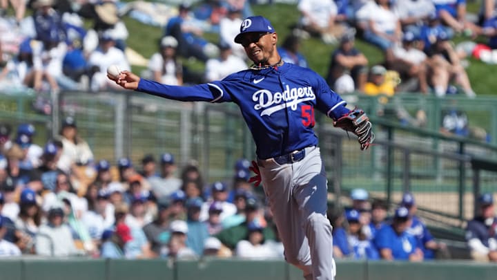 Mar 8, 2025; Phoenix, Arizona, USA; Los Angeles Dodgers shortstop Mookie Betts (50) makes the play for an out against the Chicago White Sox in the second inning at Camelback Ranch-Glendale. Mandatory Credit: Rick Scuteri-Imagn Images