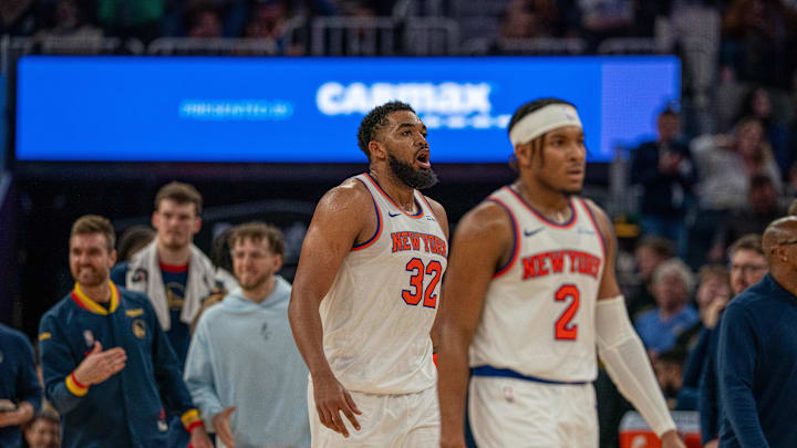 New York Knicks center Karl-Anthony Towns reacts after being called for a foul against the Golden State Warriors. Mandatory Credit: Neville E. Guard-Imagn Images