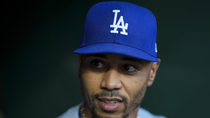 Jul 29, 2025; Cincinnati, Ohio, USA;  Los Angeles Dodgers shortstop Mookie Betts (50) stands in the dugout before the game against the Cincinnati Reds at Great American Ball Park. Mandatory Credit: Aaron Doster-Imagn Images