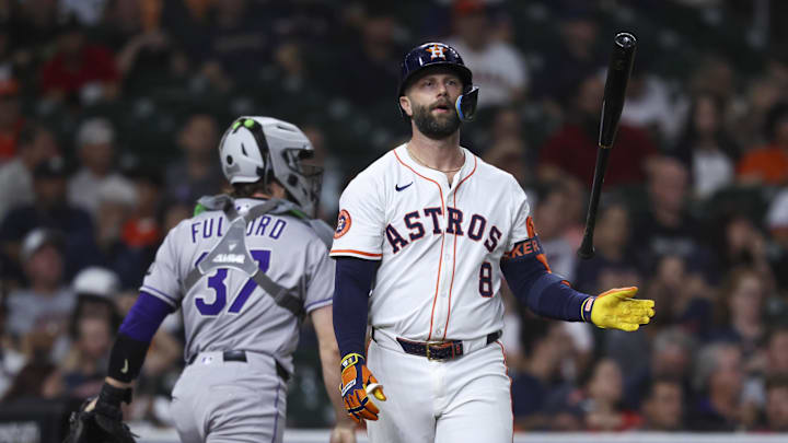 Christian Walker of Houston Astros walks off field, Christian Walker of Houston Astros walks off field,