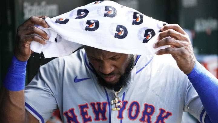 Jun 21, 2024; Chicago, Illinois, USA; New York Mets outfielder Starling Marte (6) cools off in the dugout against the Chicago Cubs during the seventh inning at Wrigley Field. Mandatory Credit: David Banks-USA TODAY Sports