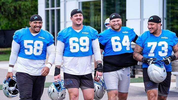 From left, Detroit Lions offensive tackle Penei Sewell (58), guard Tate Ratledge (69), center Cade Mays (64) and offensive lineman Christian Mahogany (73) before OTAs at Meijer Performance Center in Allen Park on Thursday, June 11, 2026.