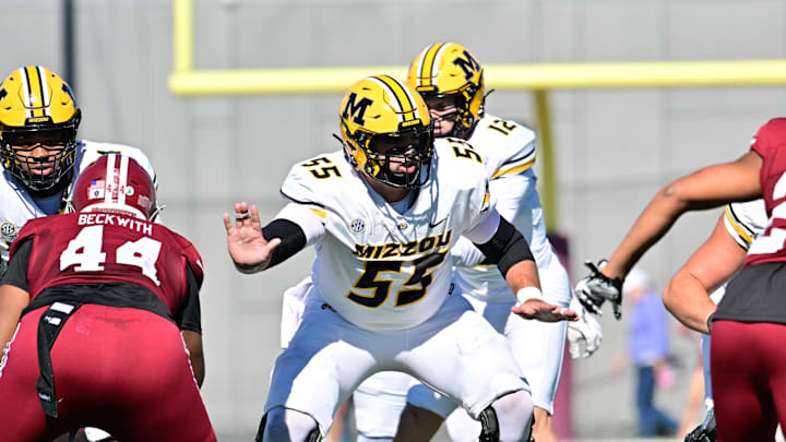 Oct 12, 2024; Amherst, Massachusetts, USA; Missouri Tigers offensive lineman Connor Tollison (55) protects the pocket during the first half against the Massachusetts Minutemen at Warren McGuirk Alumni Stadium. Mandatory Credit: Eric Canha-Imagn Images