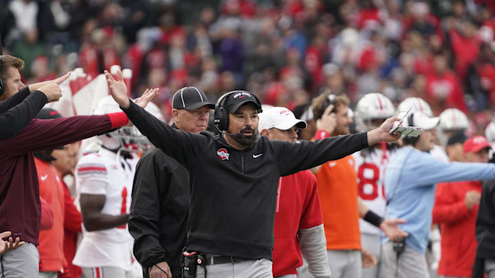 Nov 16, 2024; Chicago, Illinois, USA; Ohio State Buckeyes head coach Ryan Day gestures to the officials against the Northwestern Wildcats during the second half at Wrigley Field. Mandatory Credit: David Banks-Imagn Images