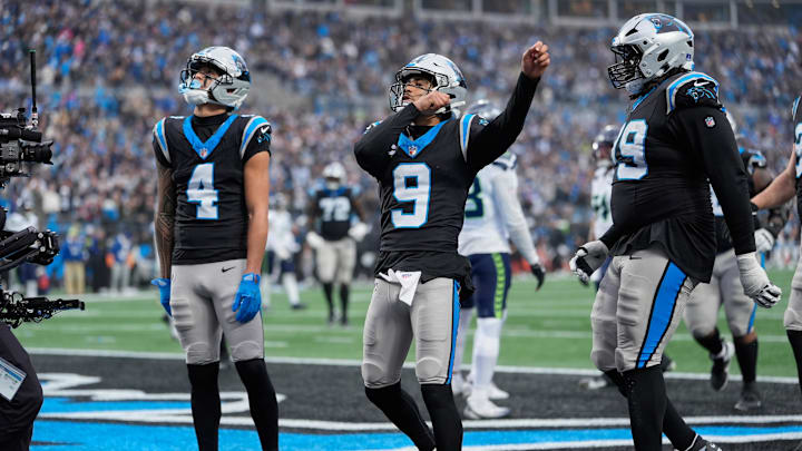 Dec 28, 2025; Charlotte, North Carolina, USA; Carolina Panthers quarterback Bryce Young (9) acknowledges the crowd after scoring a touchdown against the Seattle Seahawks during the third quarter at Bank of America Stadium. Mandatory Credit: Jim Dedmon-Imagn Images