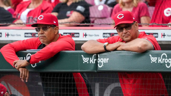 Cincinnati Reds bench coach/field coordinator Freddie Benavides (45) and manager Terry Francona (77) look on from the dugout in the second inning of the MLB National League game between the Cincinnati Reds and the San Francisco Giants at Great American Ball Park on Thursday, April 16, 2026.