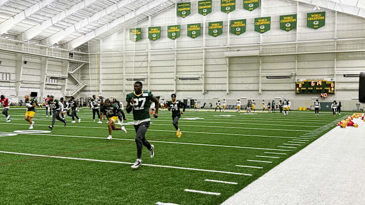 The Packers get warmed up before practice on Friday. The Packers get warmed up before practice on Friday.