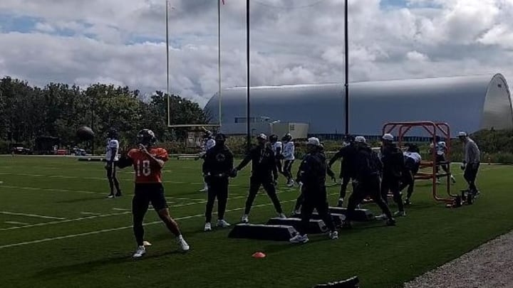 Offensive player of the week Caleb Williams catches a throw during a drill Wednesday prior to practice.