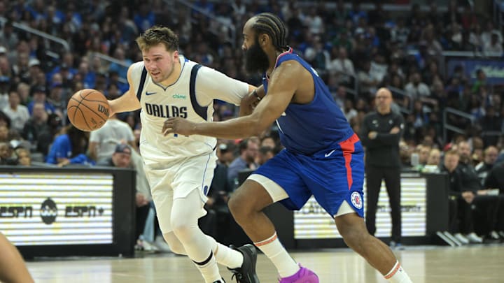  Apr 21, 2024; Los Angeles, California, USA; Dallas Mavericks guard Luka Doncic (77) is defended by