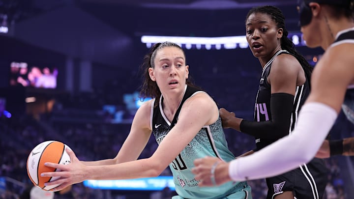 Sep 2, 2025; San Francisco, California, USA; New York Liberty forward Breanna Stewart (30) controls the ball against Golden State Valkyries center Temi Fagbenle (14) during the first quarter at Chase Center. Mandatory Credit: Kelley L Cox-Imagn Images