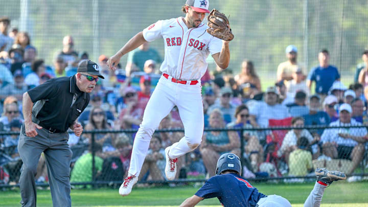 Gavin Kelly of Bourne arrrives safely at third under the tag of Chris Hacopian of Y-D in the Cape League final
Aug. 12 2025